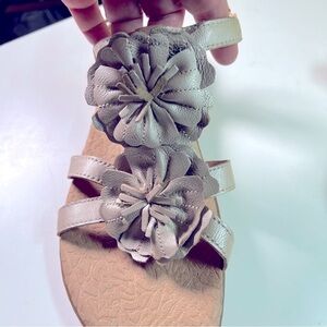 boc by Born Goldish Metallic Sandals with two flowers adornment. Buckle closure